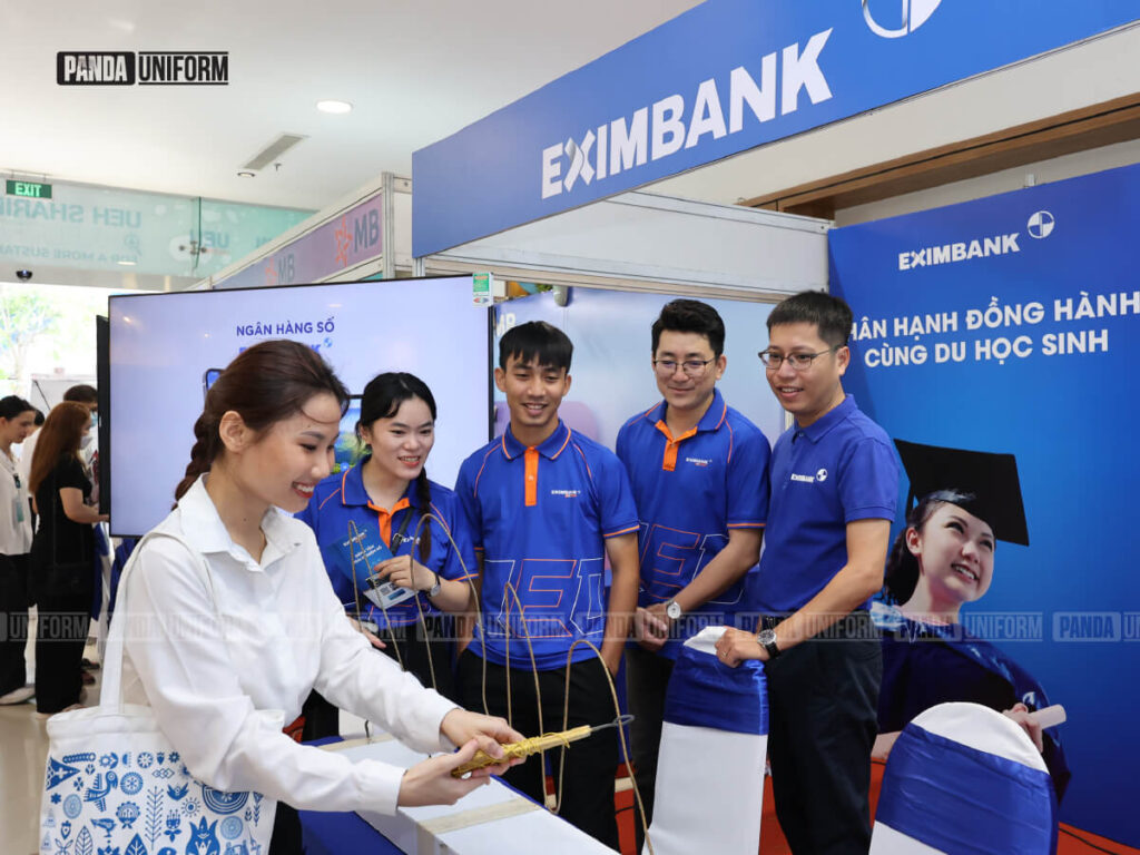 áo polo xanh phối cổ cam - mẫu đồng phục của ngân hàng eximbank