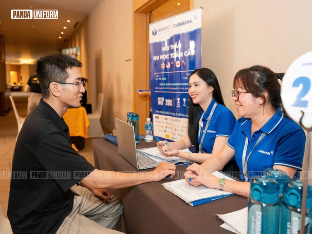 đồng phục ngân hàng eximbank dáng áo polo màu xanh