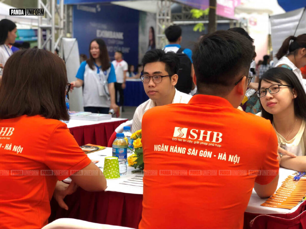 thiết kế áo polo cam đồng phục của shb