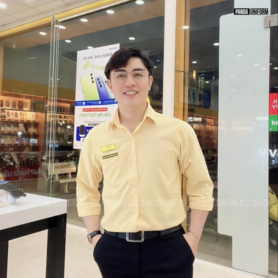 sơ mi thế giới di động màu vàng đặc trưng