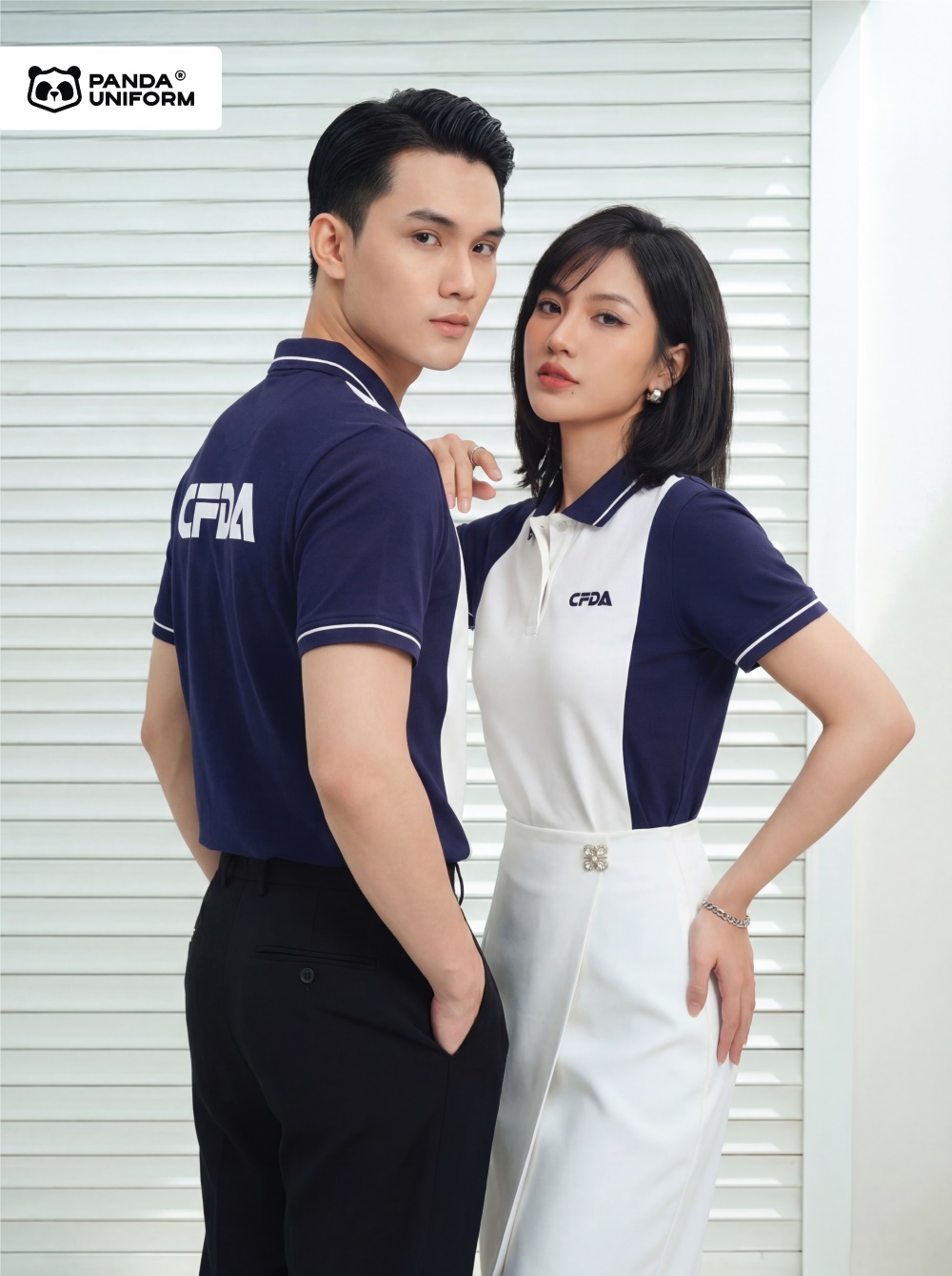 Mẫu áo polo xanh tím than phối trắng đồng phục công ty